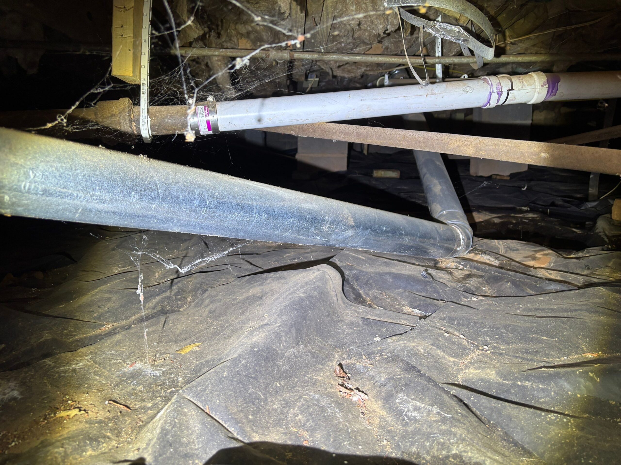 Damaged and dirty crawl space